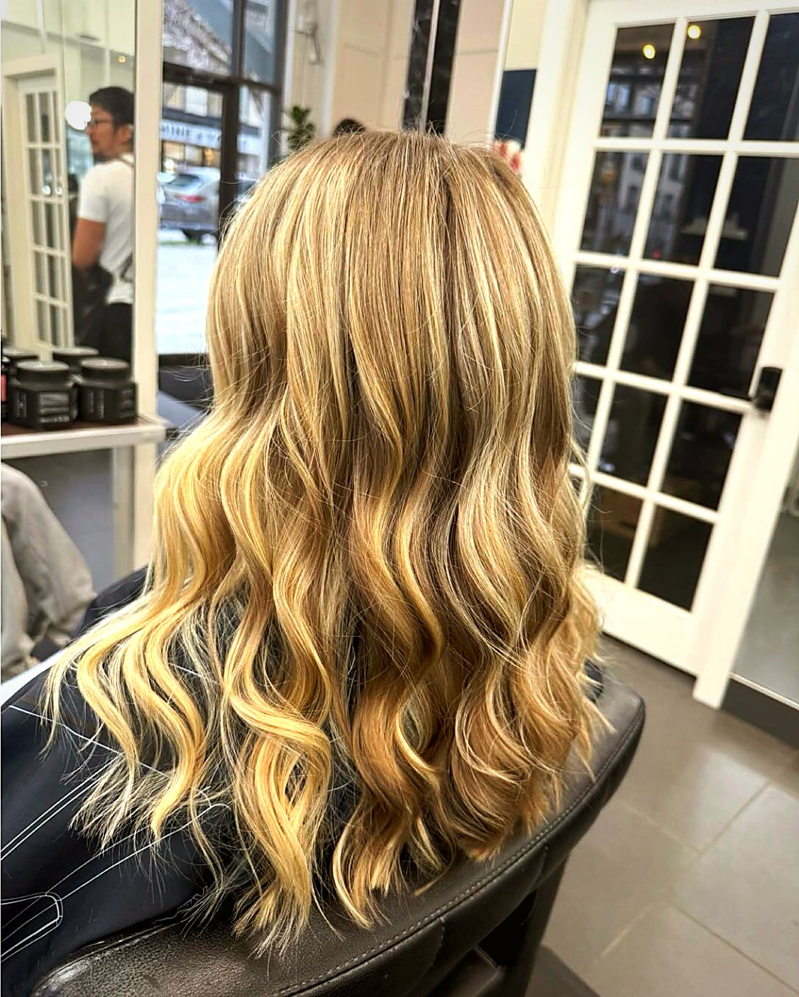 Cool blonde balayage and waves