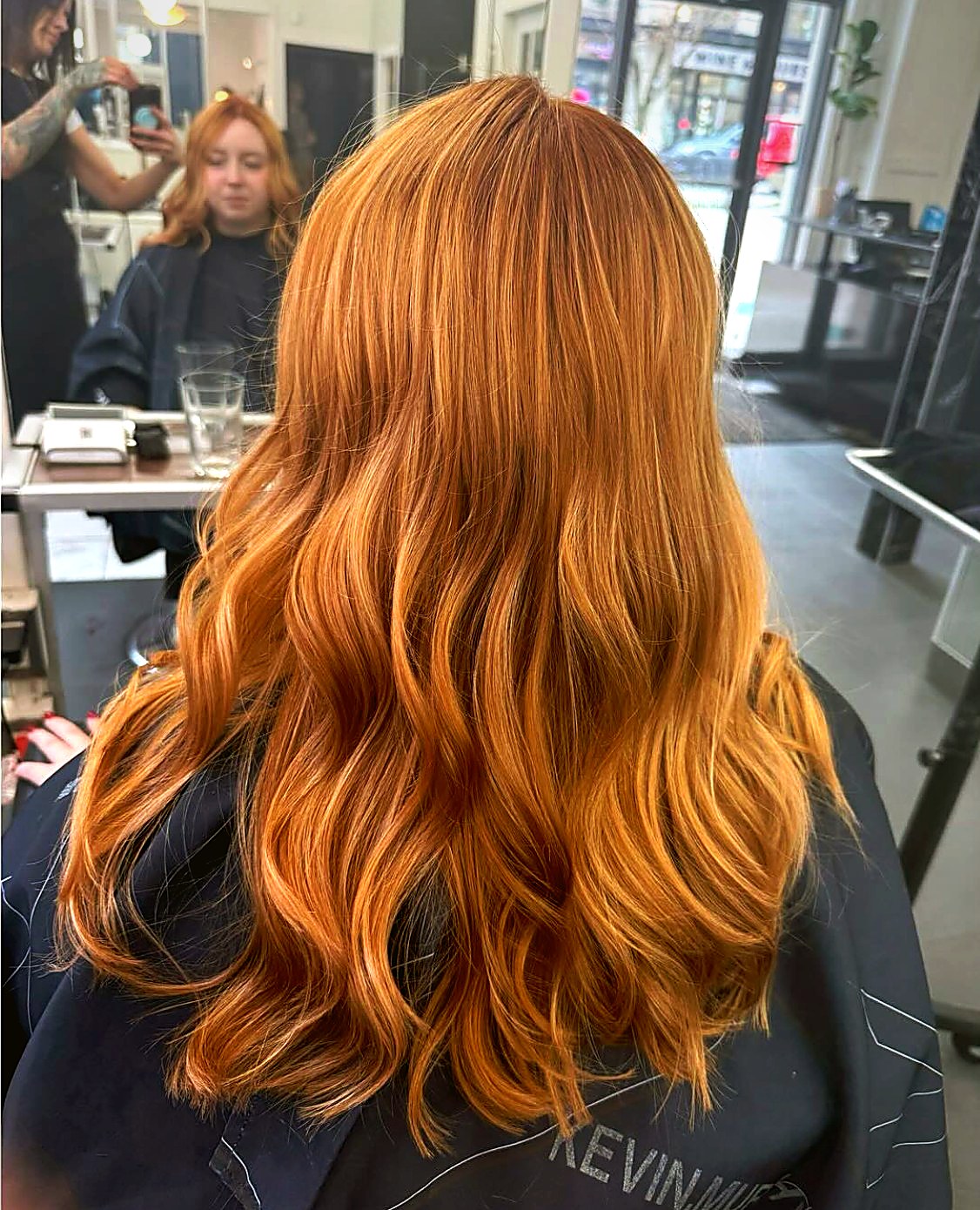 Copper-toned long waves styled by Sheena at Style Lab Yaletown