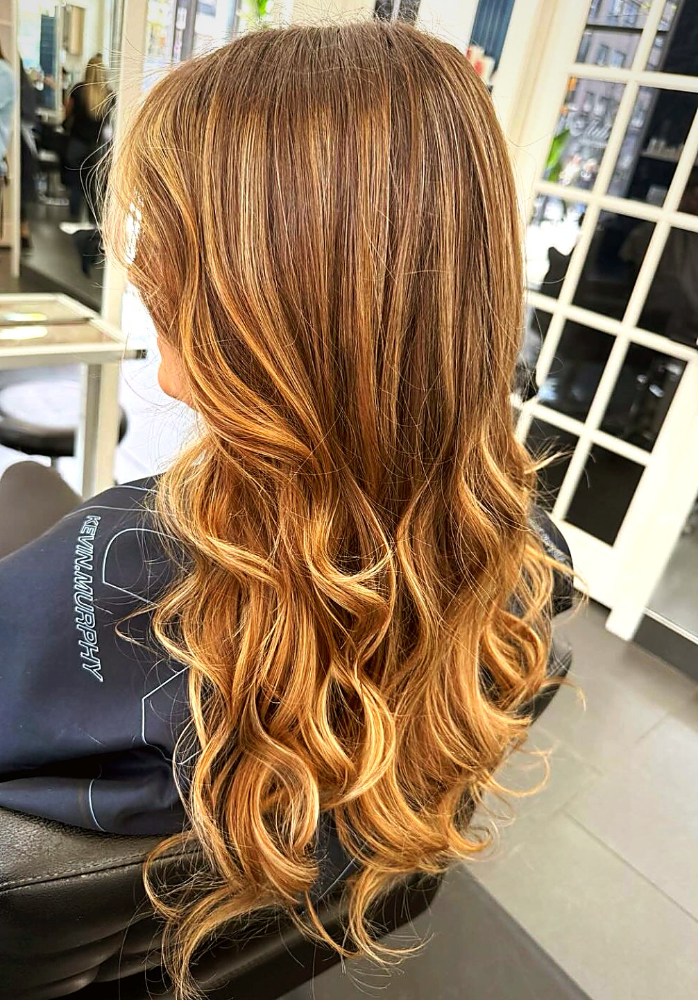 Honey beige balayage with smudged root
